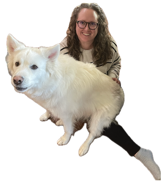 Lindsey holding her fluffy white dog Bao